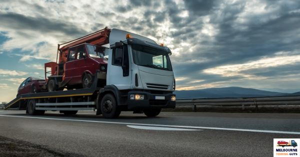 What is the maximum towing capacity for a flatbed tow truck?